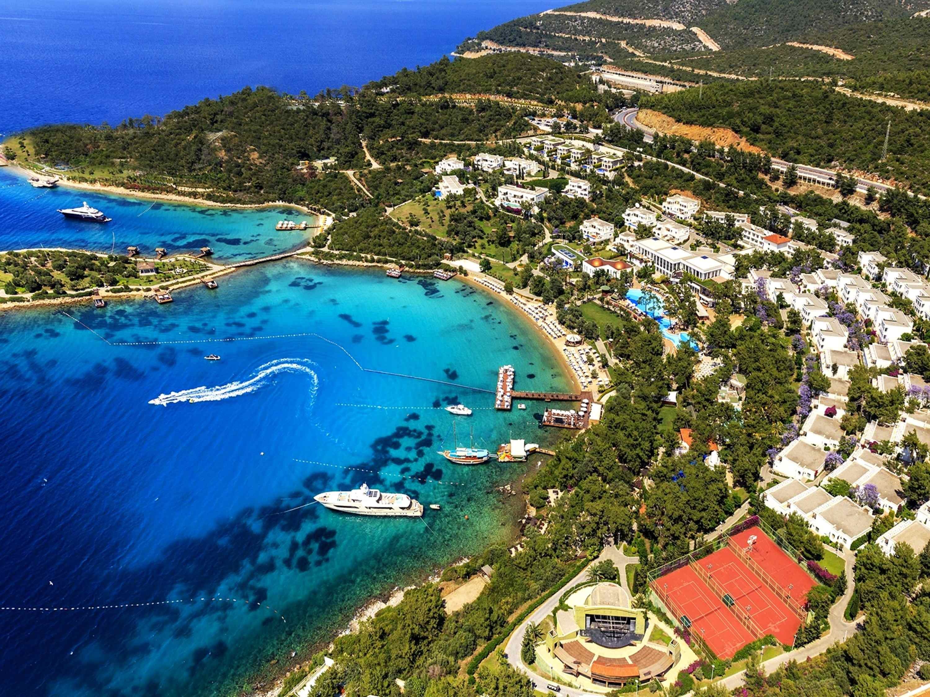 Photo of Rixos Bodrum Beach with turquoise pure water surface