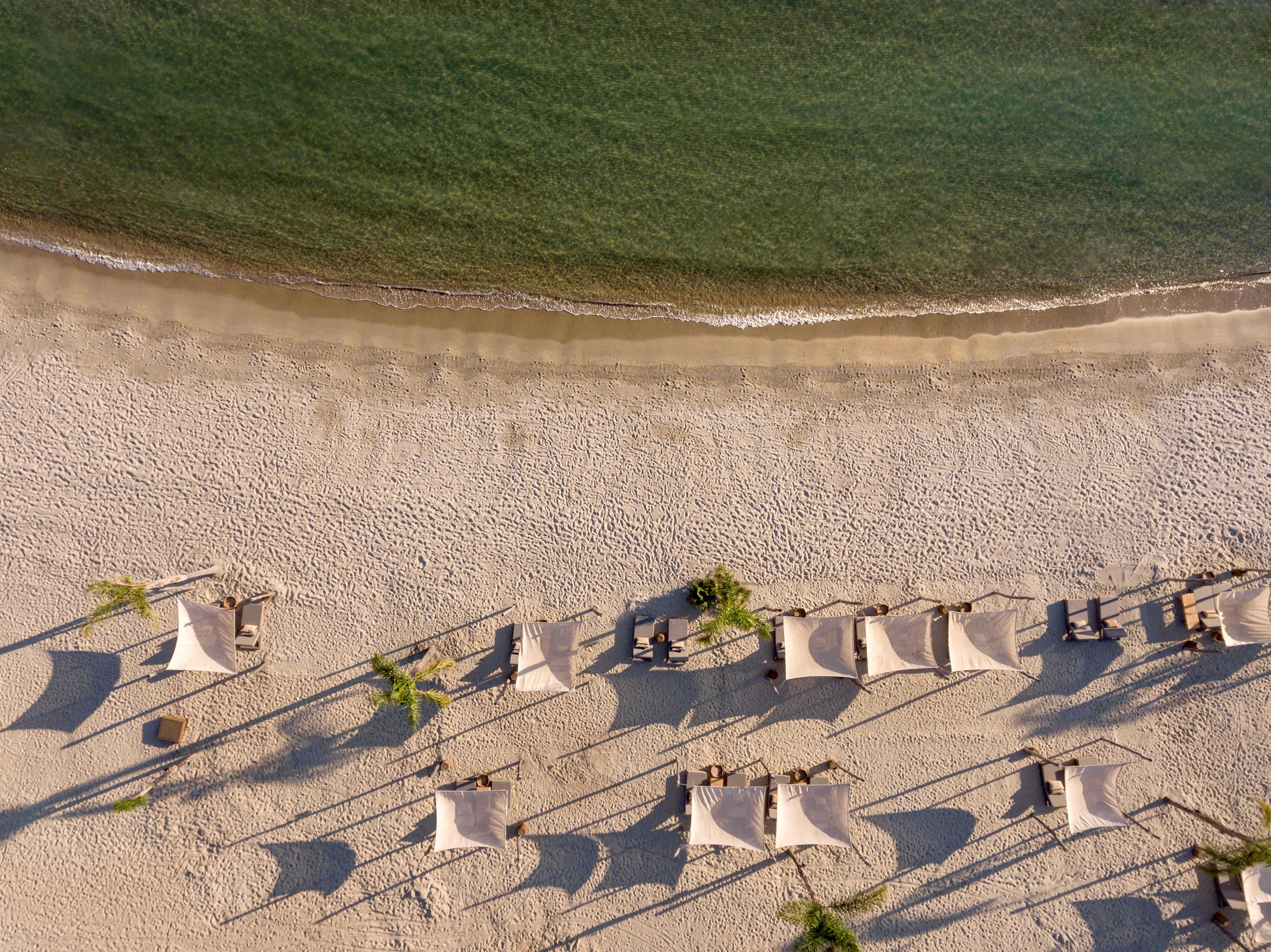 Zdjęcie Six Senses Plaża II z powierzchnią turkusowa czysta woda
